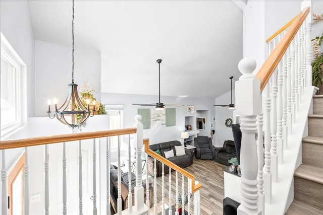 a view of living room with furniture and floor to ceiling window