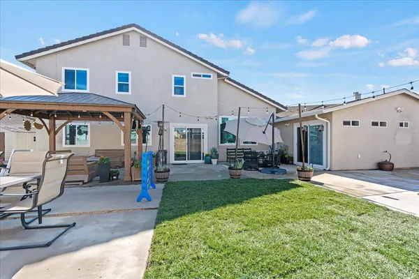 a view of a house with swimming pool