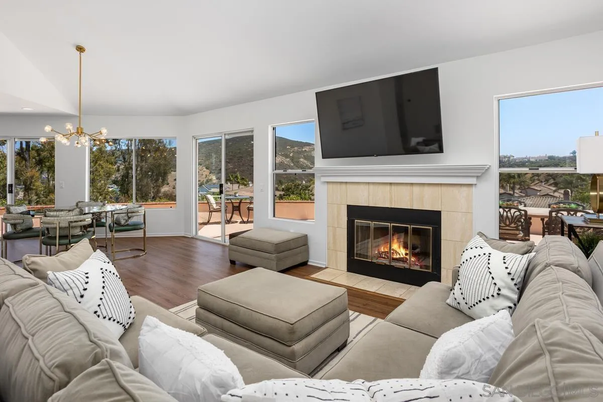 1201 Rue St Jean San Marcos, CA 92078 - Photo 1 of 73 a living room with furniture fireplace and flat screen tv