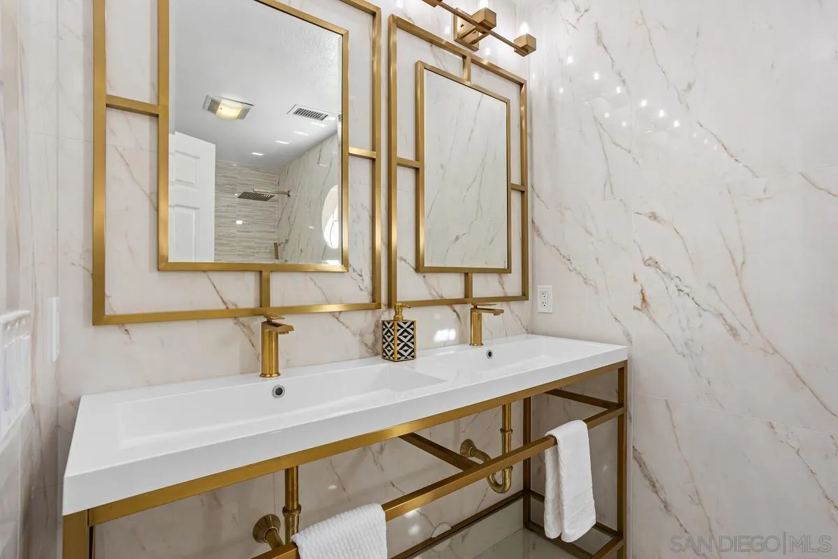 1201 Rue St Jean San Marcos, CA 92078 - Photo 24 of 73 a bathroom with a sink and a mirror