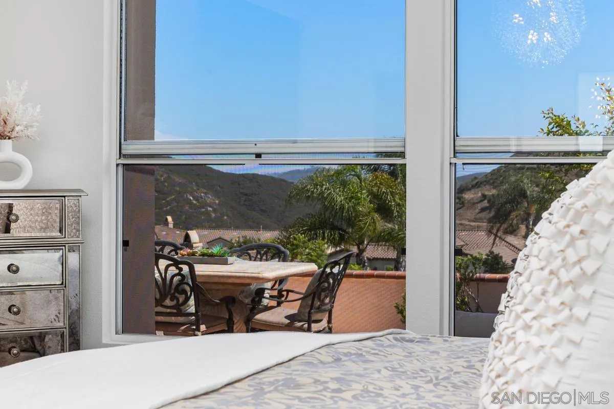 1201 Rue St Jean San Marcos, CA 92078 - Photo 31 of 73 a bedroom with furniture and a window