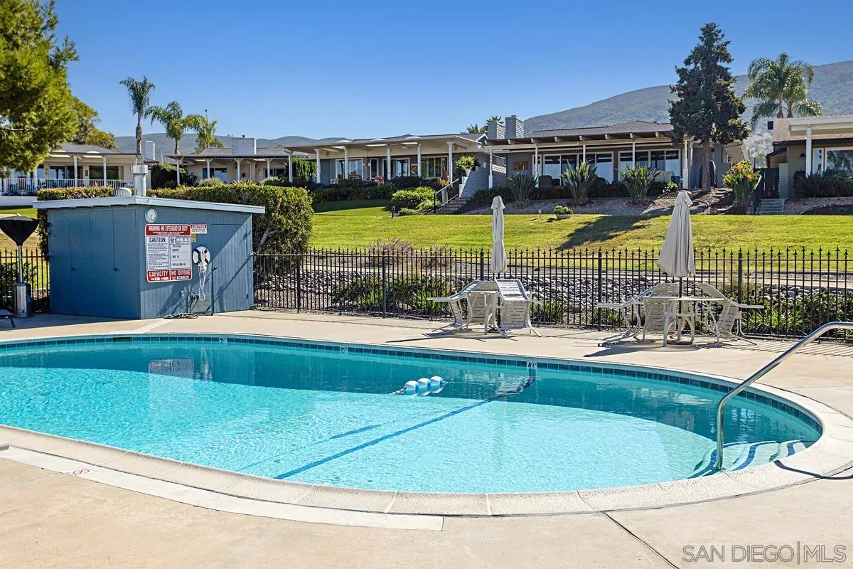 1201 Rue St Jean San Marcos, CA 92078 - Photo 58 of 73 a view of a swimming pool with a patio