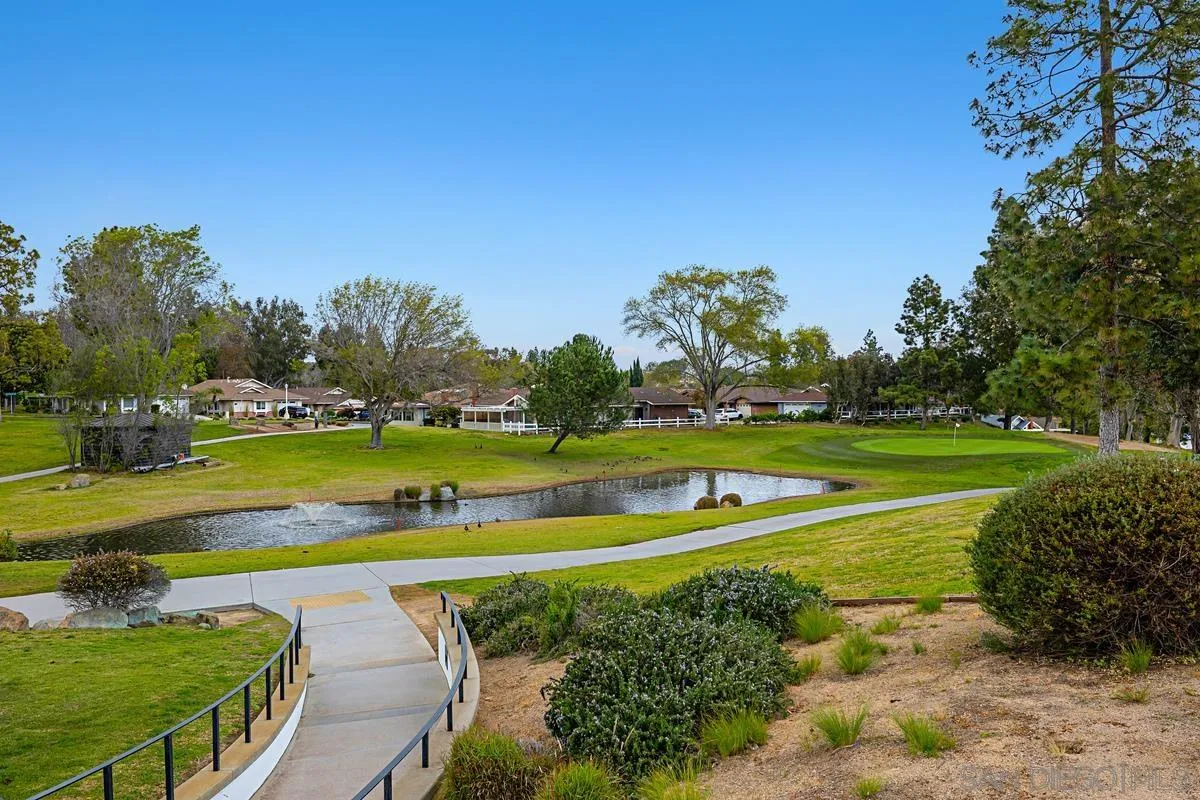 1201 Rue St Jean San Marcos, CA 92078 - Photo 61 of 73 a view of a golf course with a lake