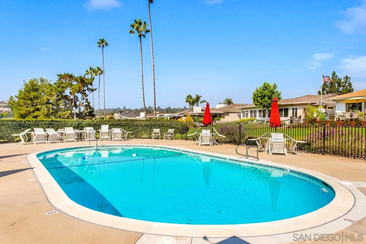 1201 Rue St Jean San Marcos, CA 92078 - Photo 73 of 73 a view of a swimming pool with a lounge chairs