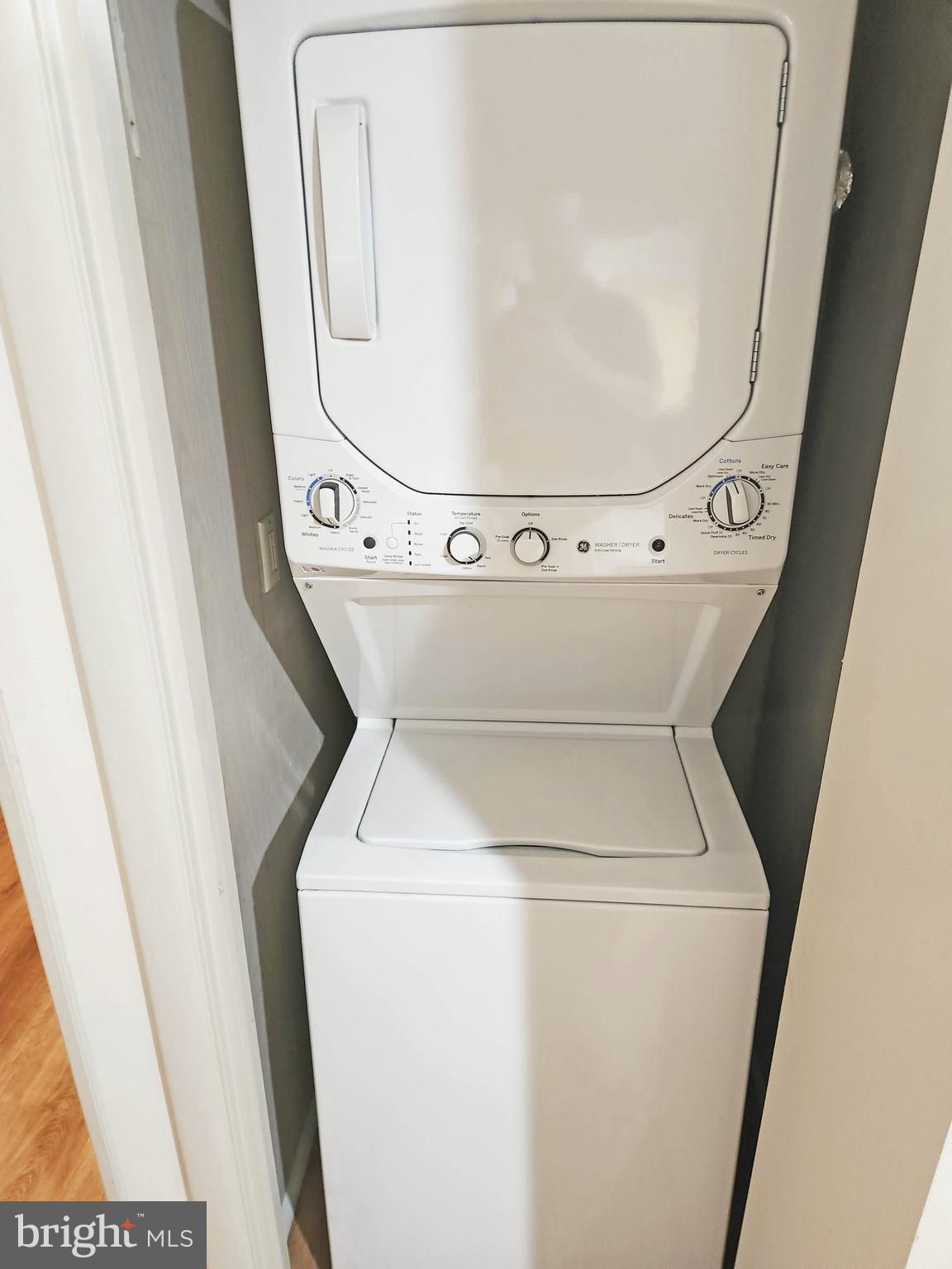 12 77th Street, Unit 103 Ocean City, MD 21842 - Photo 14 of 14 a utility room with dryer and washer