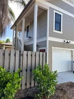 a front view of a house with stairs