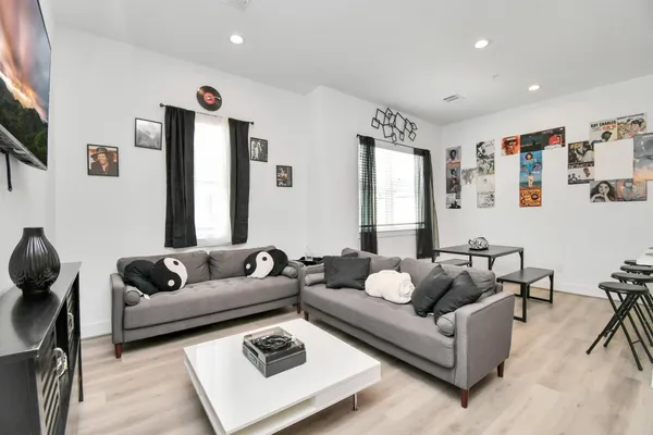 a living room with furniture and a couch