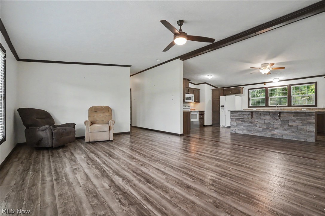 3424 Painesville Warren State Road Southington, OH 44470 - Photo 12 of 50 3424 Painesville Warren Rd, Southington, OH 44470 – Enjoy comfortable one-floor living in this well-maintained home built in 2018. Featuring 3 bedrooms, 2 full bathrooms, and an open-concept layout, this home offers both functionality and convenience. The spacious kitchen, dining, and living areas provide plenty of room for everyday living and entertaining. A large garage offers ample space for vehicles, storage, hobbies, or workshop needs. Situated on a generous lot with a welcoming front porch, this property combines modern living with a peaceful country setting. Move-in ready and waiting for its next owner!