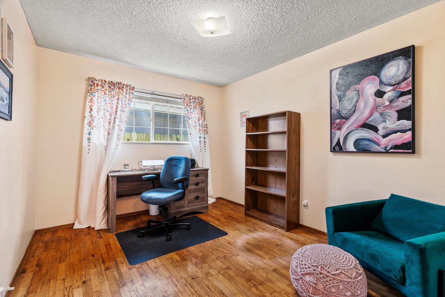 842 Central Avenue Salinas, CA 93901 - Photo 13 of 24 a view of a livingroom with workspace and a couch