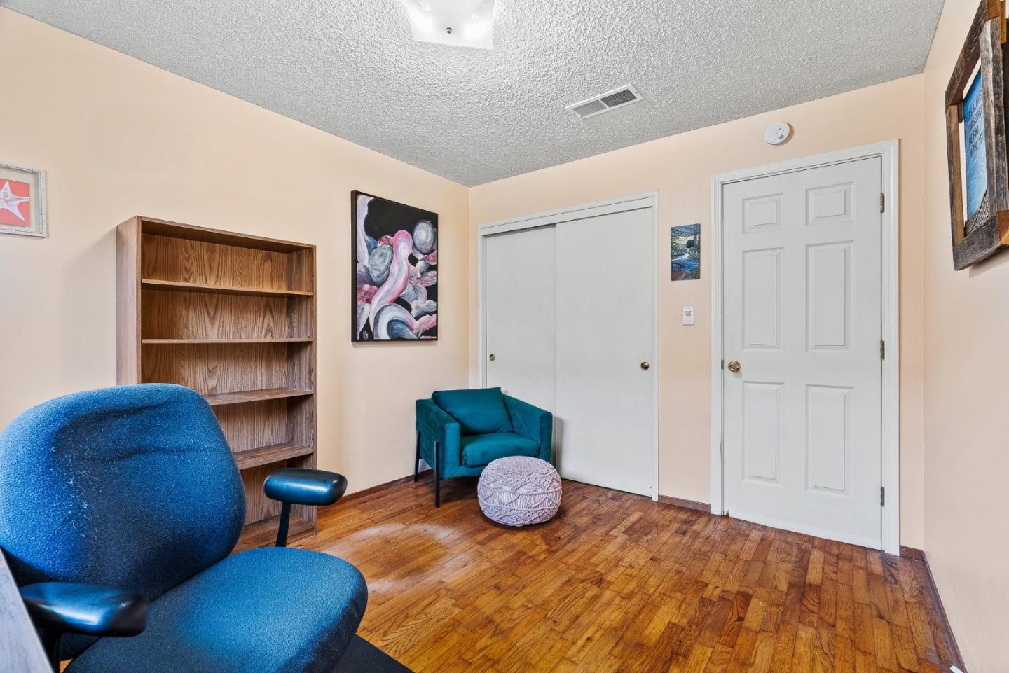 842 Central Avenue Salinas, CA 93901 - Photo 14 of 24 a bedroom with furniture and a closet