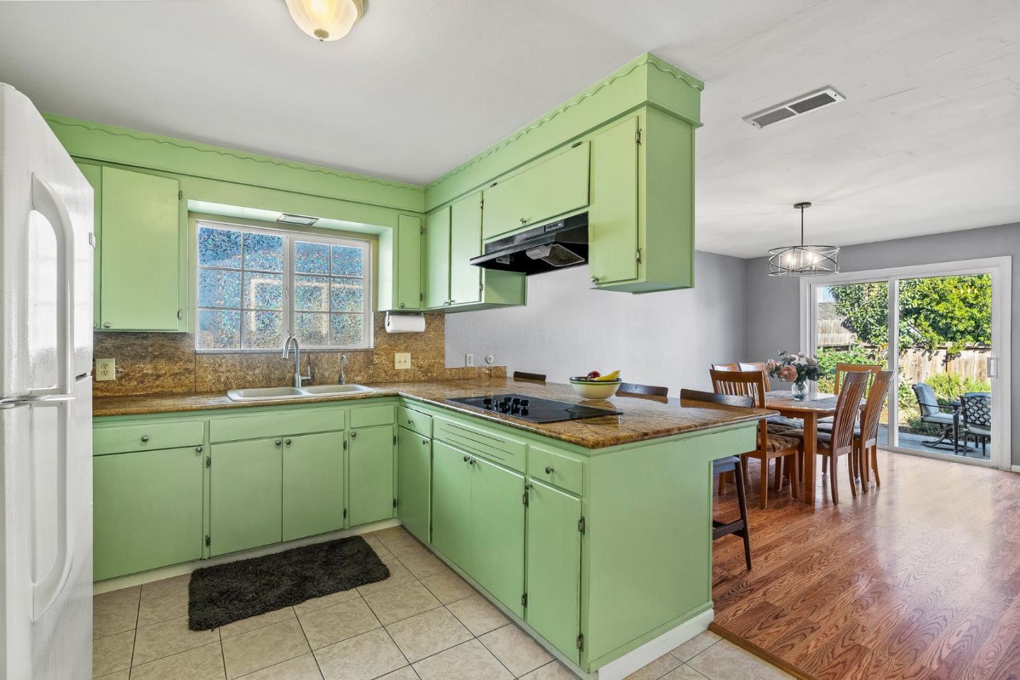 842 Central Avenue Salinas, CA 93901 - Photo 20 of 24 a kitchen with a sink and a stove top oven