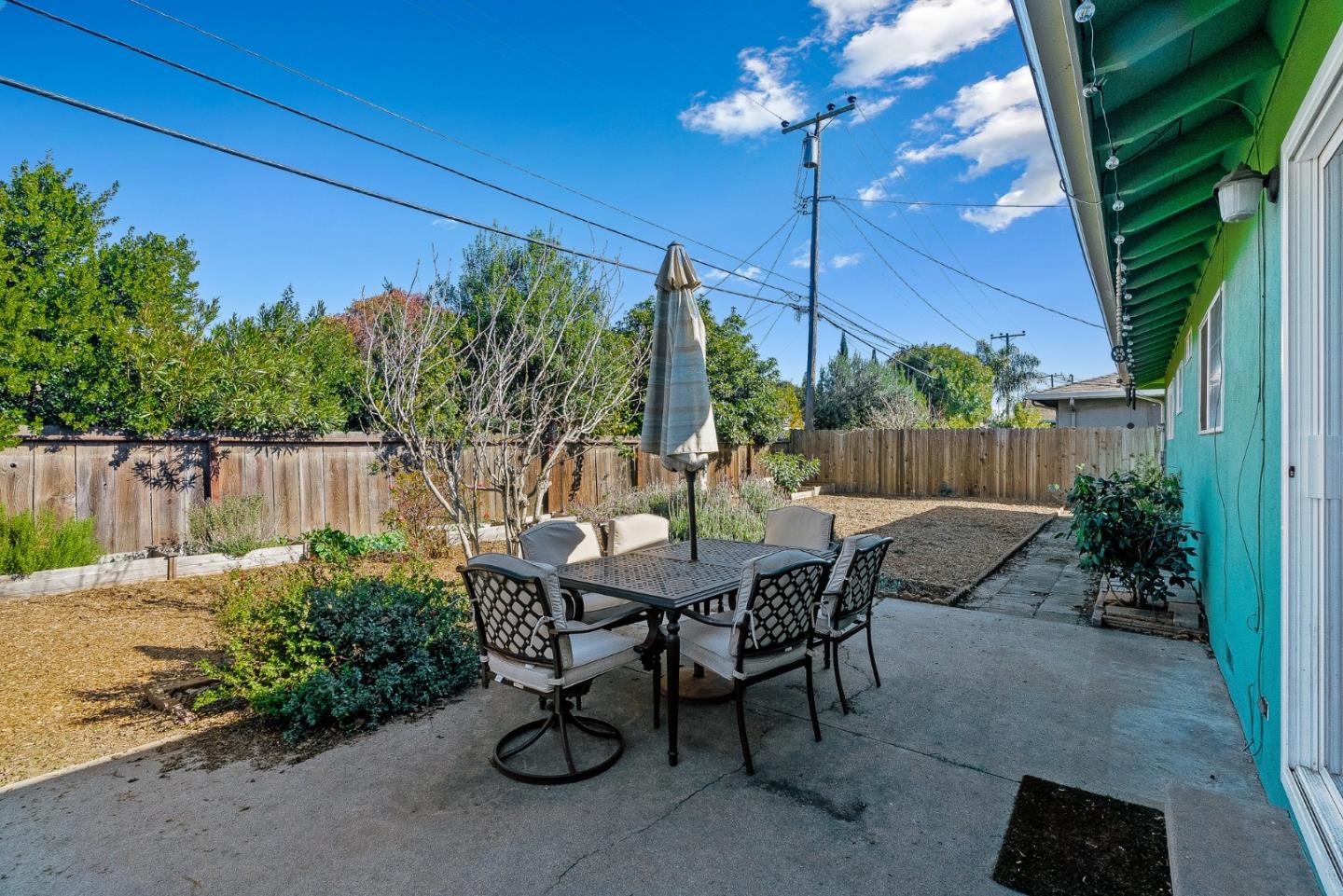 842 Central Avenue Salinas, CA 93901 - Photo 22 of 24 a view of a table and chairs in back yard of a house