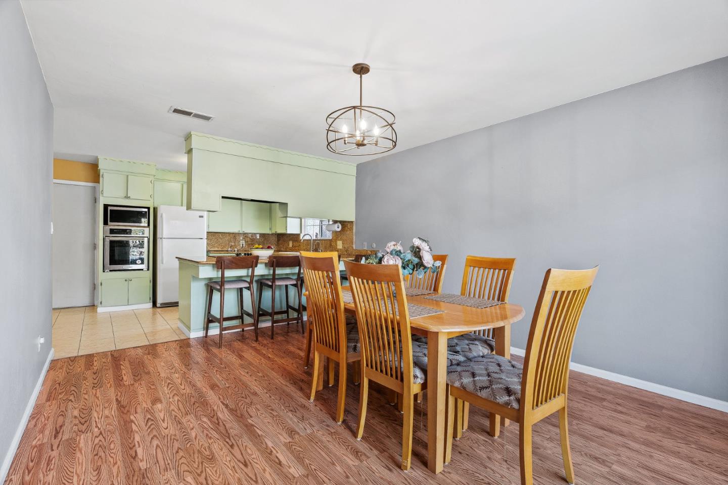 842 Central Avenue Salinas, CA 93901 - Photo 10 of 24 a view of a dining room with furniture and wooden floor