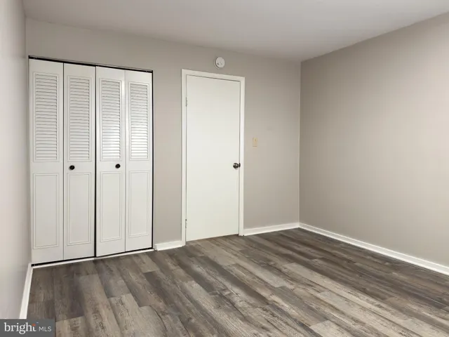 a view of a house with a door and a window