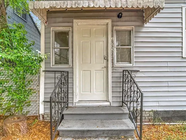 a front view of a house with a window