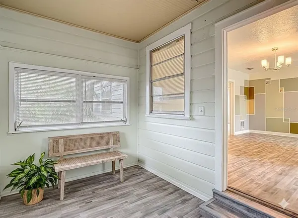 a view of front door and bedroom area
