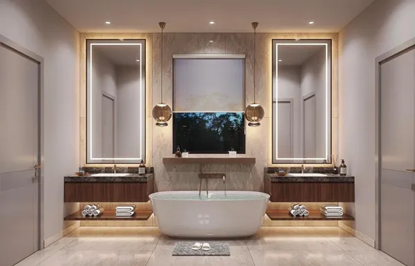 a living room with a flat screen tv and kitchen view
