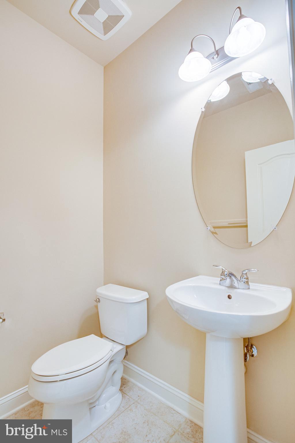 14402 Vedanta Way Silver Spring, MD 20906 - Photo 4 of 46 Half bath on main level