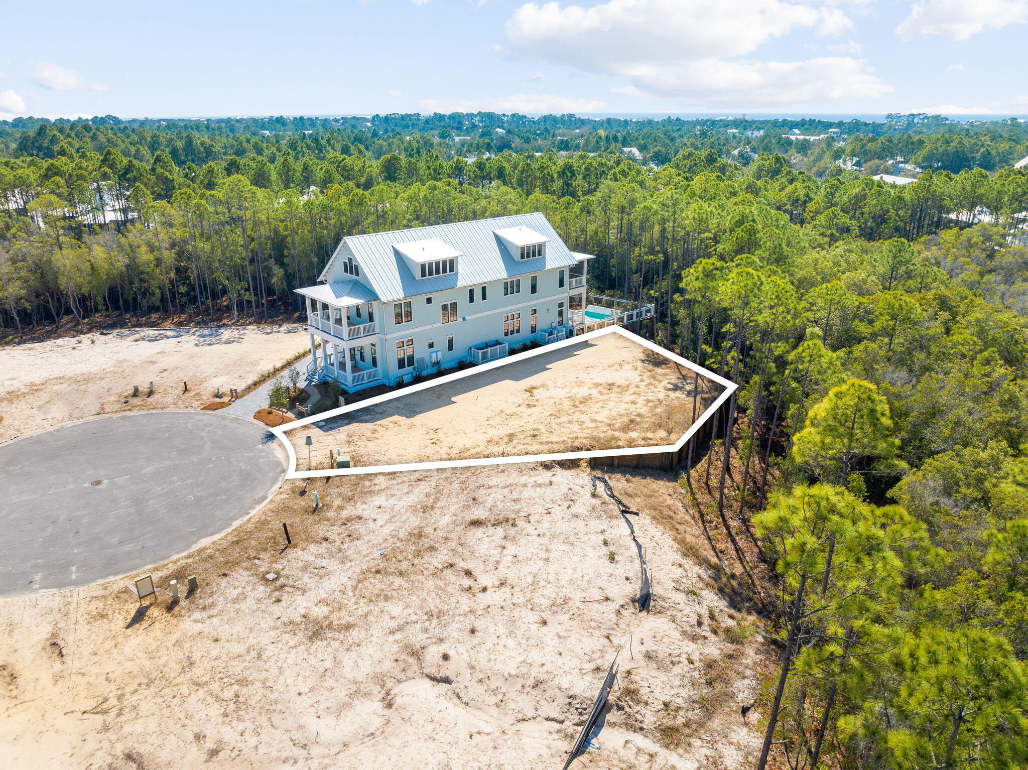 72 String Lily Cove Santa Rosa Beach, FL 32459 - Photo 12 of 25 a view of a water fountain with a yard