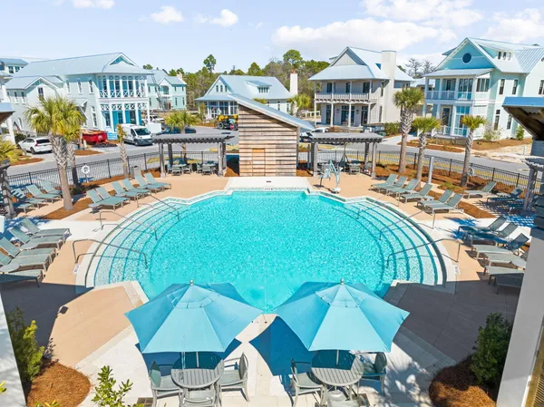 a view of a patio with swimming pool