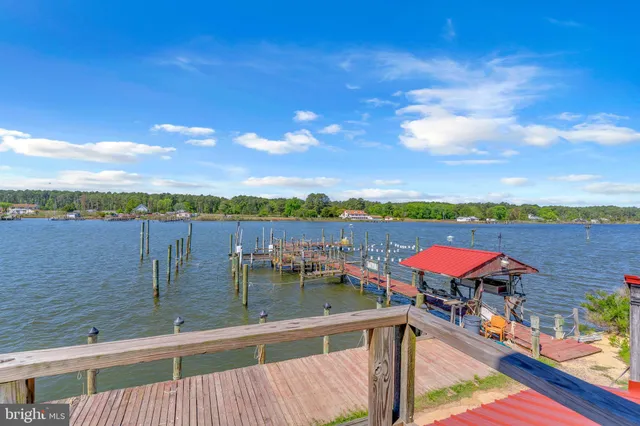 a view of swimming pool with outdoor seating