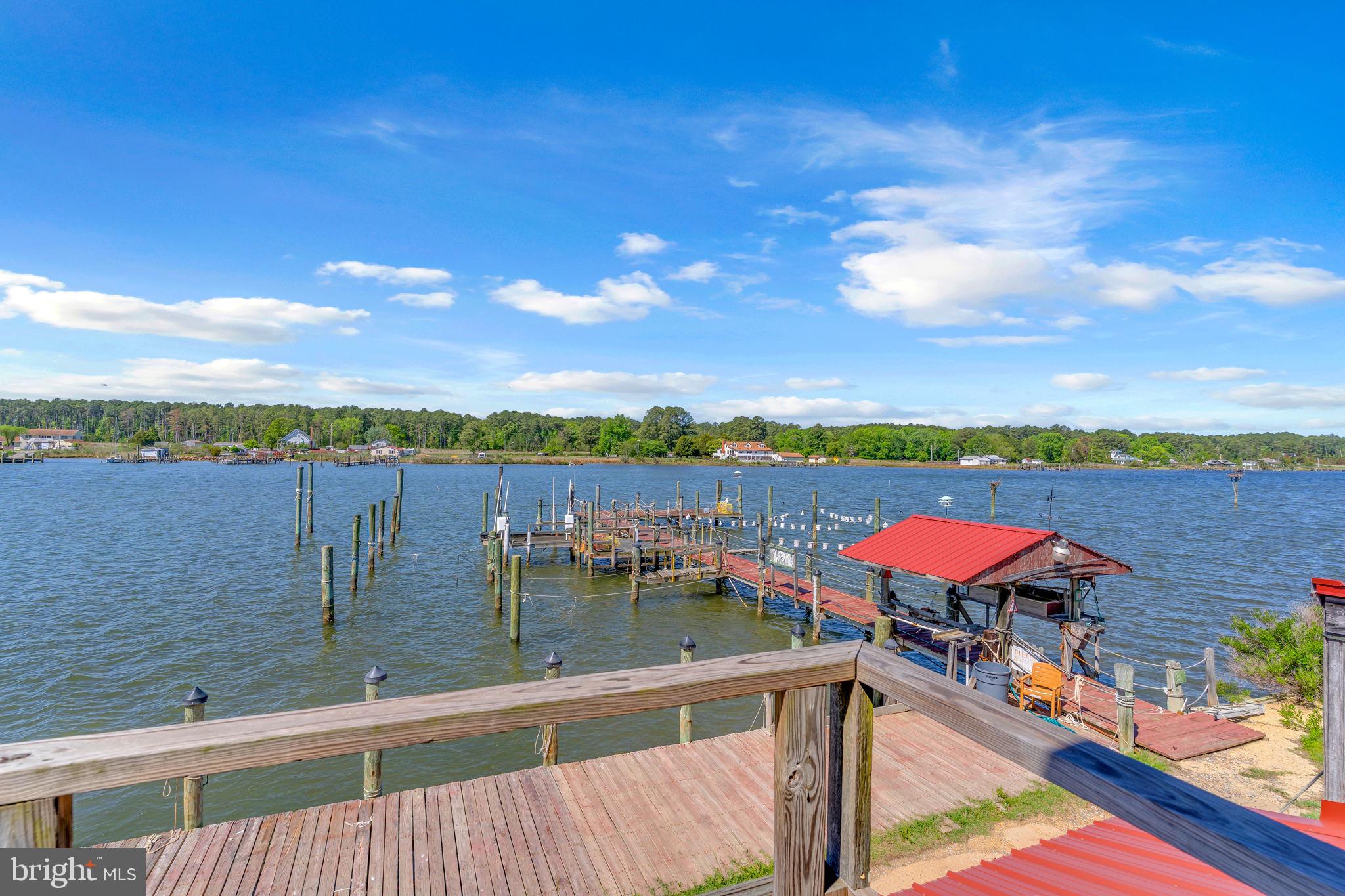 16129 Piney Point Road Piney Point, MD 20674 - Photo 12 of 50 a view of swimming pool with outdoor seating