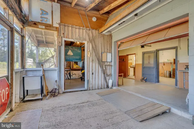 a view of a hallway with wooden building