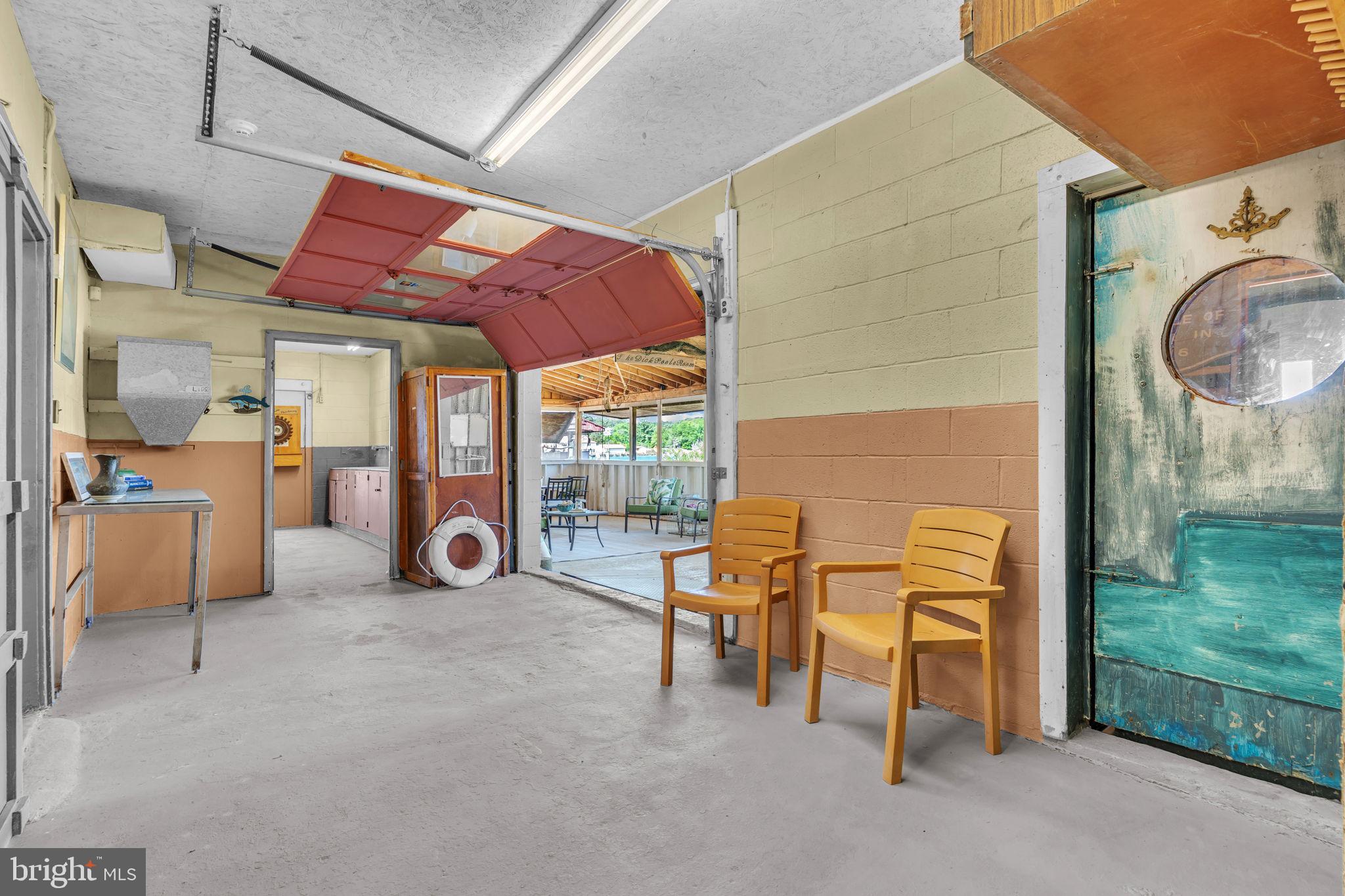 16129 Piney Point Road Piney Point, MD 20674 - Photo 22 of 50 a view of swimming pool with outdoor seating