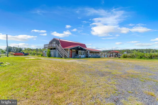 a view of an swimming pool with a yard