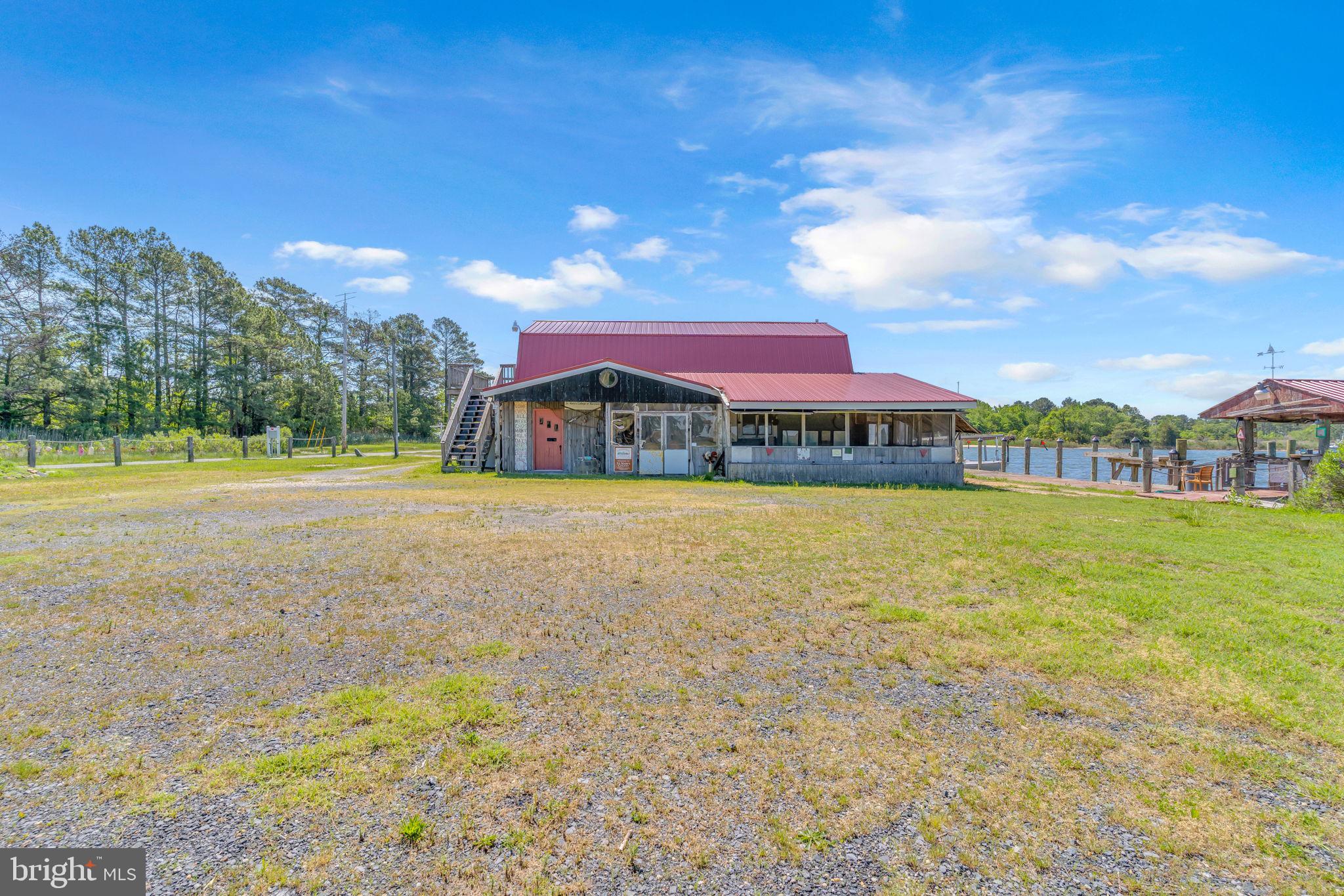 16129 Piney Point Road Piney Point, MD 20674 - Photo 38 of 50 a view of an swimming pool with a yard