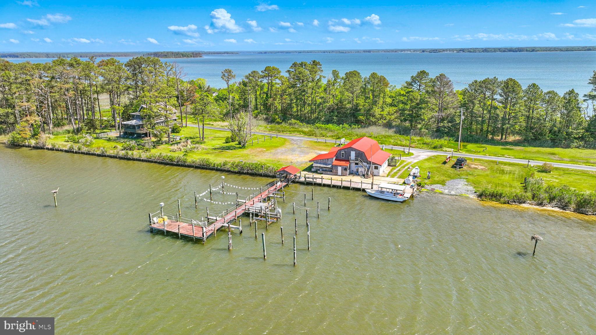 16129 Piney Point Road Piney Point, MD 20674 - Photo 45 of 50 a view of an ocean house a swimming pool and outdoor space
