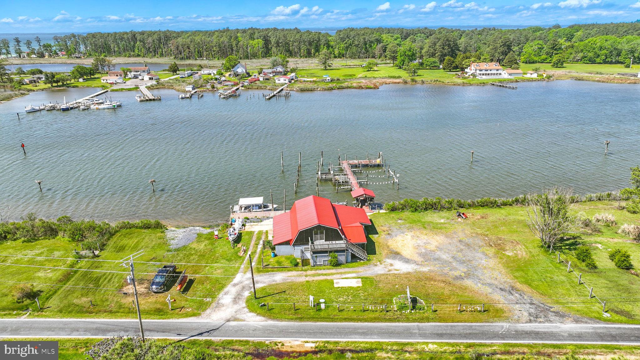 16129 Piney Point Road Piney Point, MD 20674 - Photo 49 of 50 a view of a lake from a yard