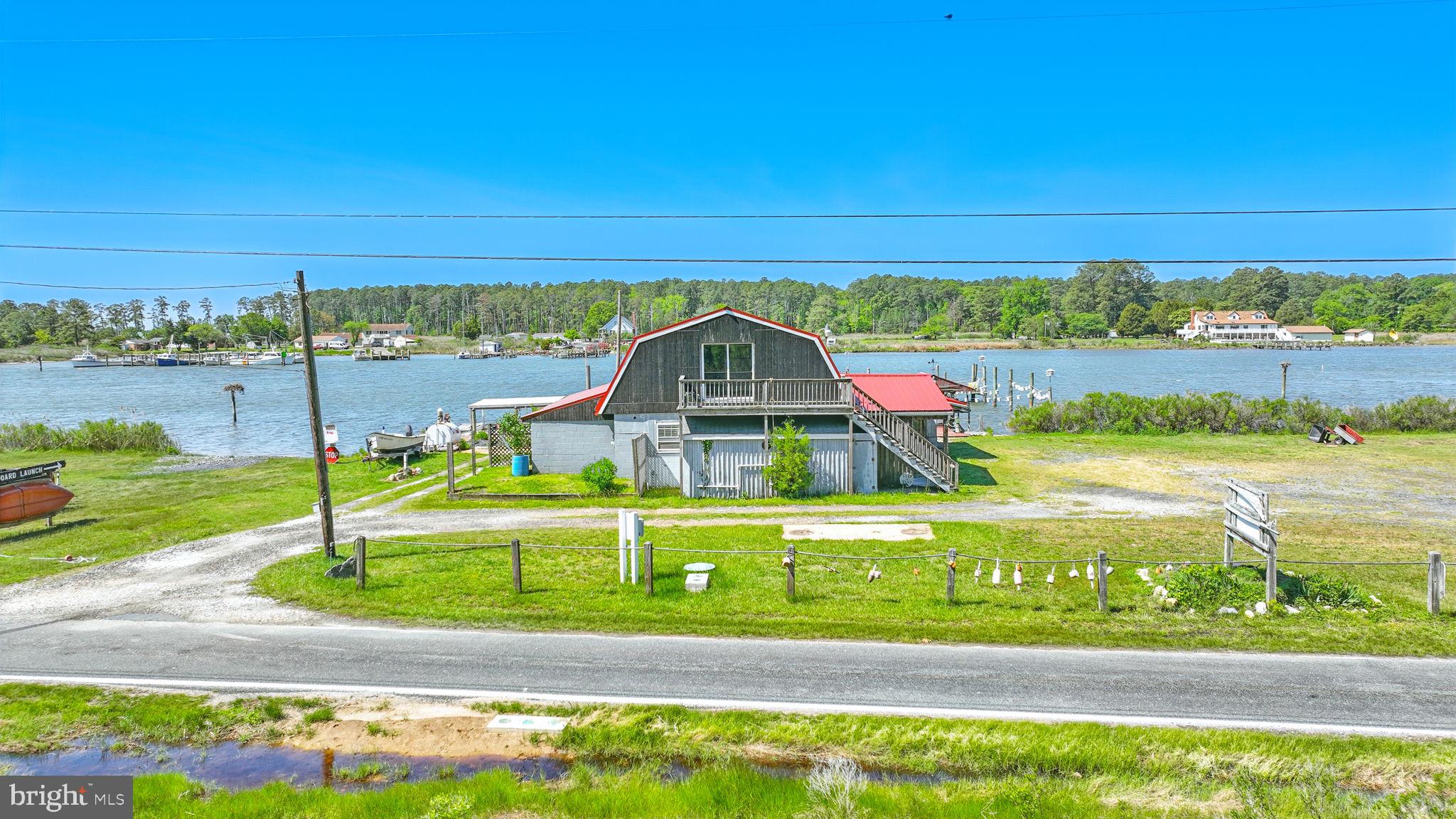 16129 Piney Point Road Piney Point, MD 20674 - Photo 50 of 50 a view of a house with a big yard