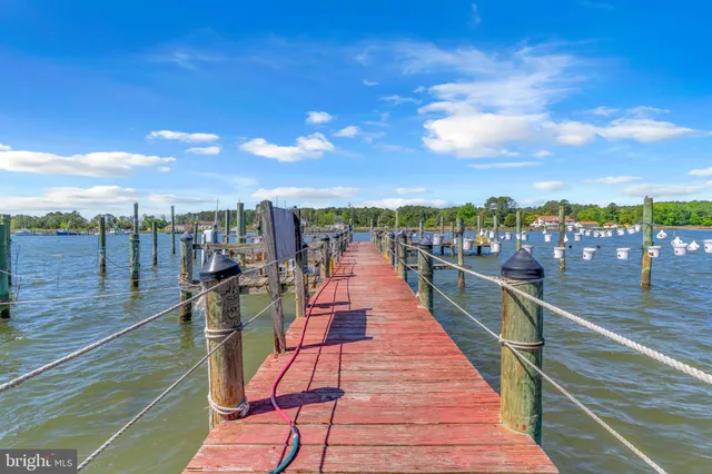 a view of a balcony with wooden floor