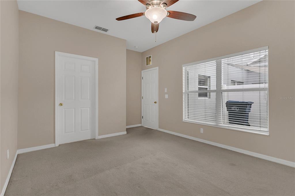 543 Rainbow Springs Loop Groveland, FL 34736 - Photo 12 of 26 a view of an empty room with a window