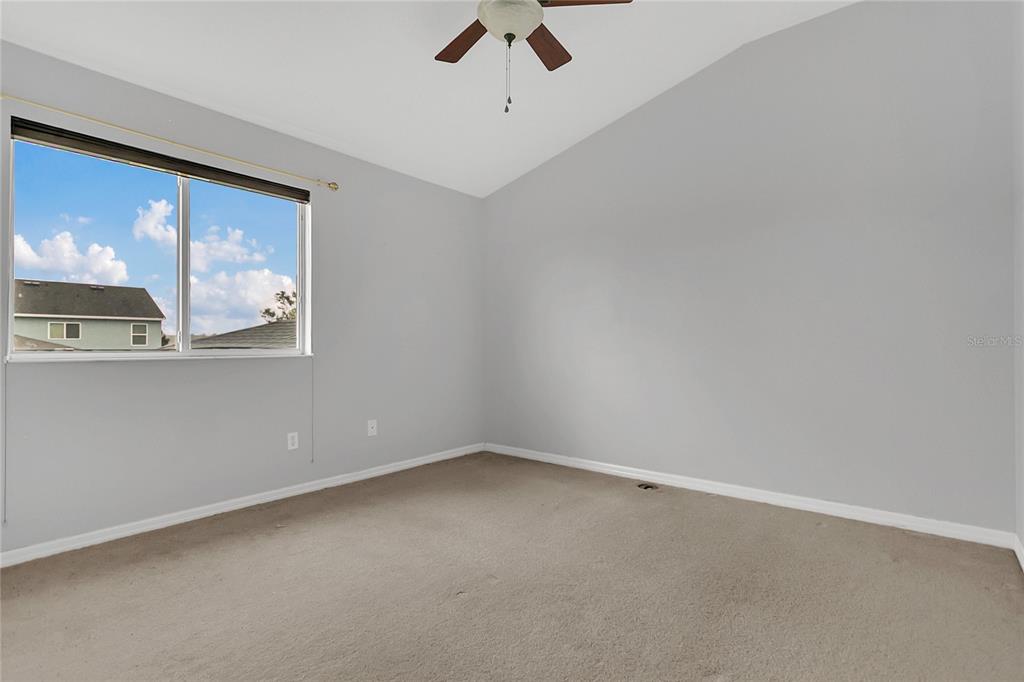 543 Rainbow Springs Loop Groveland, FL 34736 - Photo 17 of 26 an empty room with a window