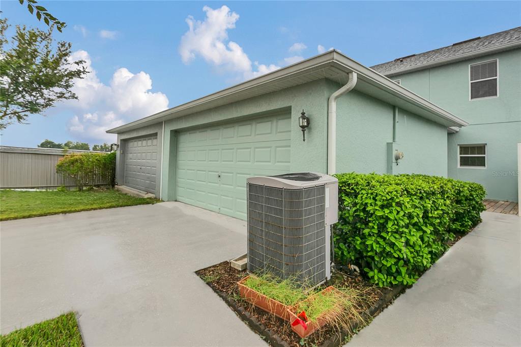 543 Rainbow Springs Loop Groveland, FL 34736 - Photo 24 of 26 a house with trees in front of it