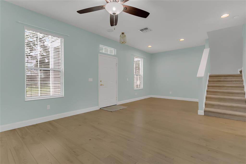 543 Rainbow Springs Loop Groveland, FL 34736 - Photo 4 of 26 a view of an empty room with a window
