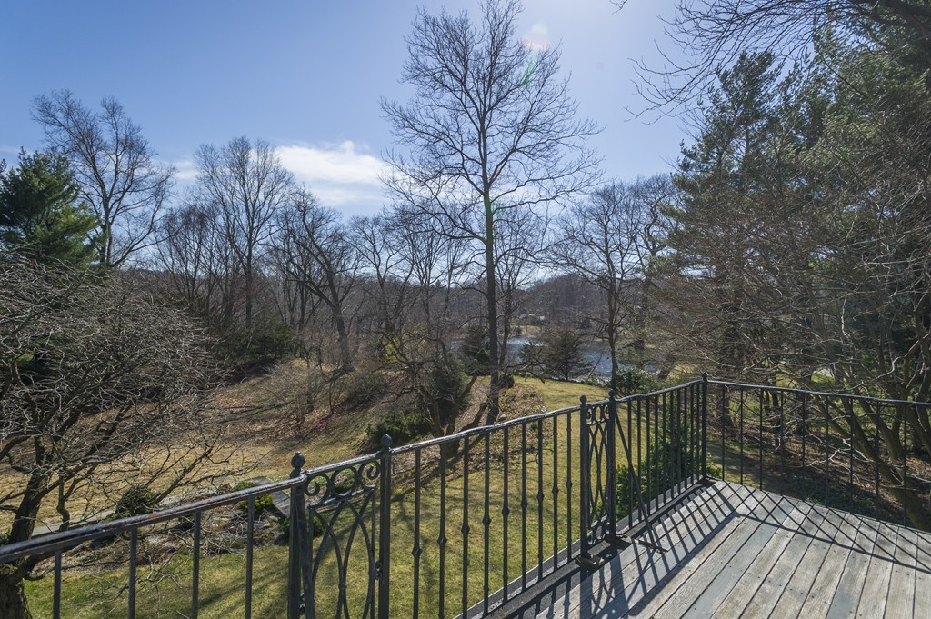 21 Sargent Crossway Brookline, MA 02445 - Photo 11 of 15 a view of a balcony with wooden fence