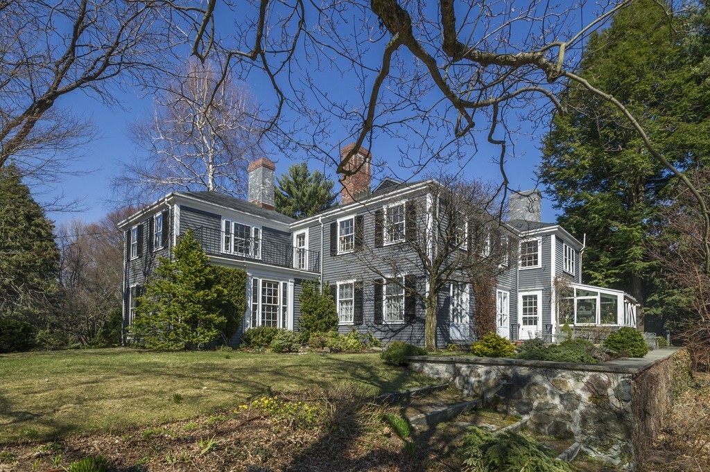 21 Sargent Crossway Brookline, MA 02445 - Photo 12 of 15 a front view of a house with a garden
