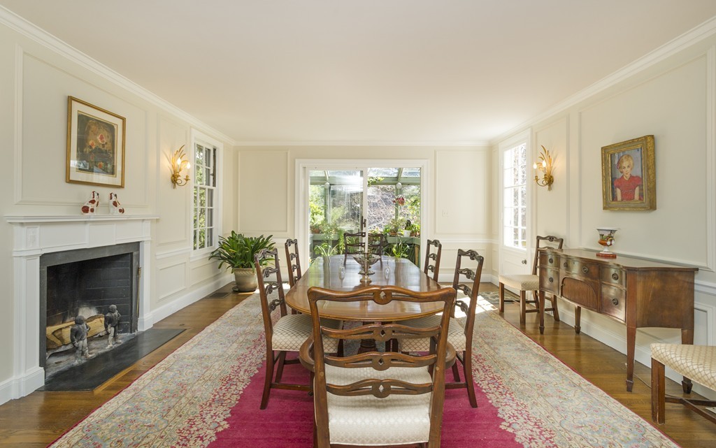 21 Sargent Crossway Brookline, MA 02445 - Photo 3 of 15 a living room with furniture and a fireplace