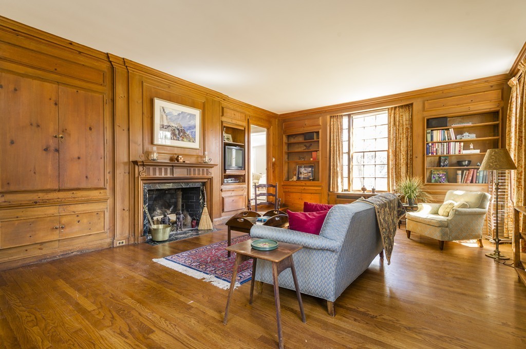 21 Sargent Crossway Brookline, MA 02445 - Photo 6 of 15 a living room with furniture and a fireplace