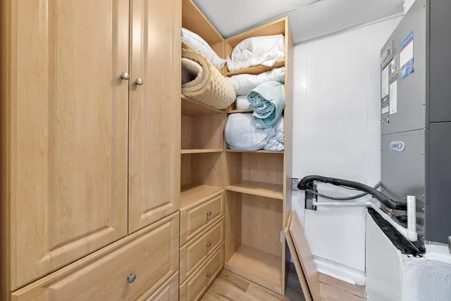 a bathroom with a shower and a sink