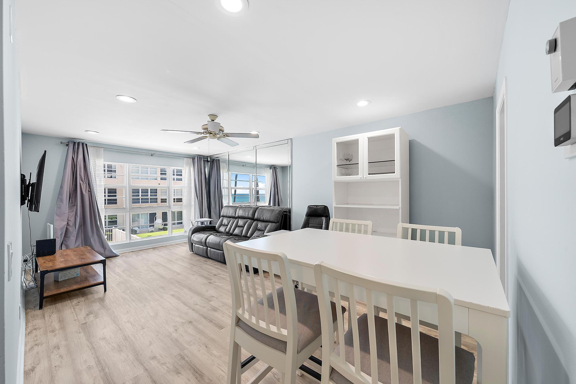 3851 North Ocean Boulevard, Unit 202 Gulf Stream, FL 33483 - Photo 4 of 20 a view of a room with gym equipment