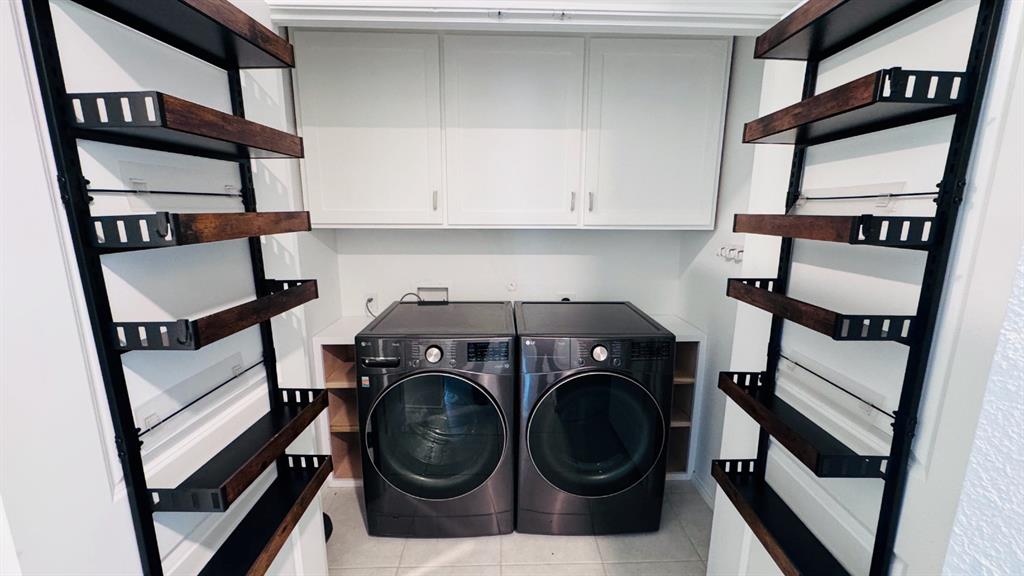 14065 Haggerston Drive Pilot Point, TX 76258 - Photo 16 of 21 a utility room with dryer and washer