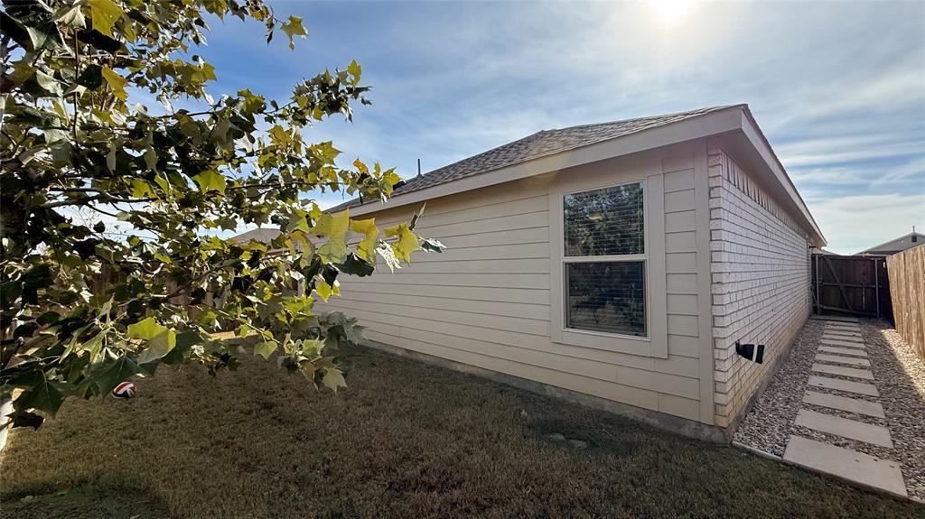 14065 Haggerston Drive Pilot Point, TX 76258 - Photo 20 of 21 a view of a house with a yard