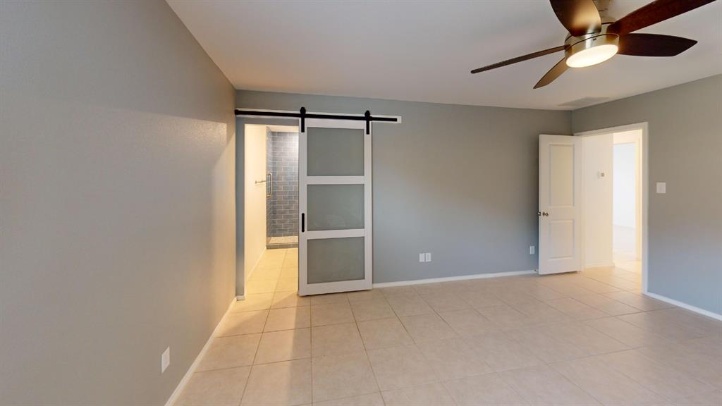 14065 Haggerston Drive Pilot Point, TX 76258 - Photo 6 of 21 a view of an empty room with a fan
