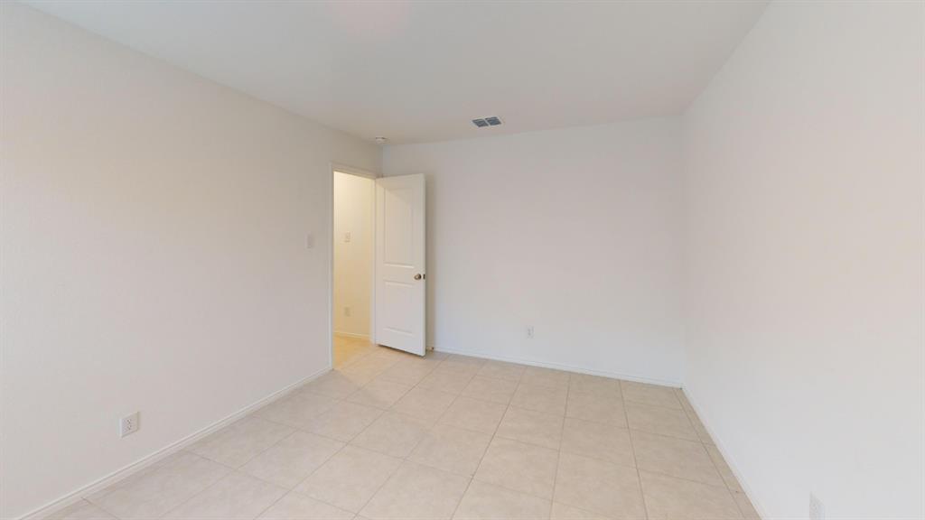 14065 Haggerston Drive Pilot Point, TX 76258 - Photo 9 of 21 a view of an empty room