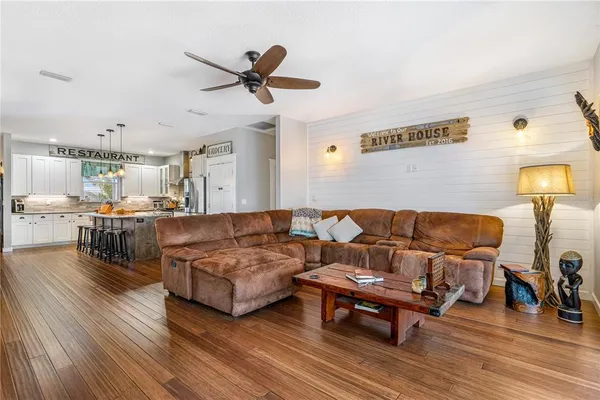 a living room with furniture and a window