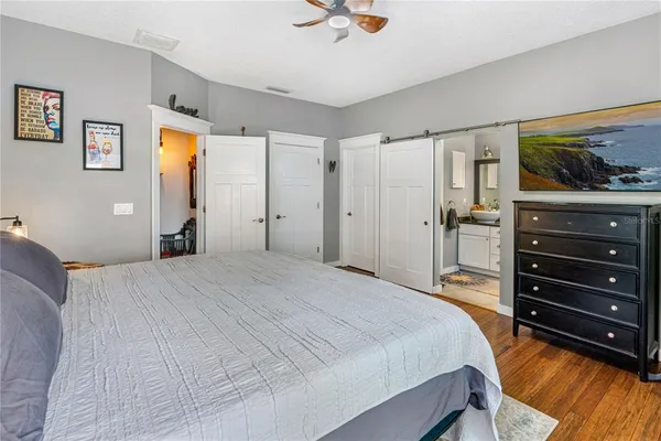 a bathroom with a toilet sink and shower